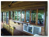 Bifold-windows-onto-verandah-from-bar