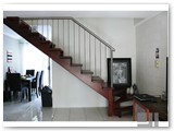 Open-rise-stairs-with-cut-stringer-and-Stainless-steel-balusters-and-handrail-using-kwila-timber